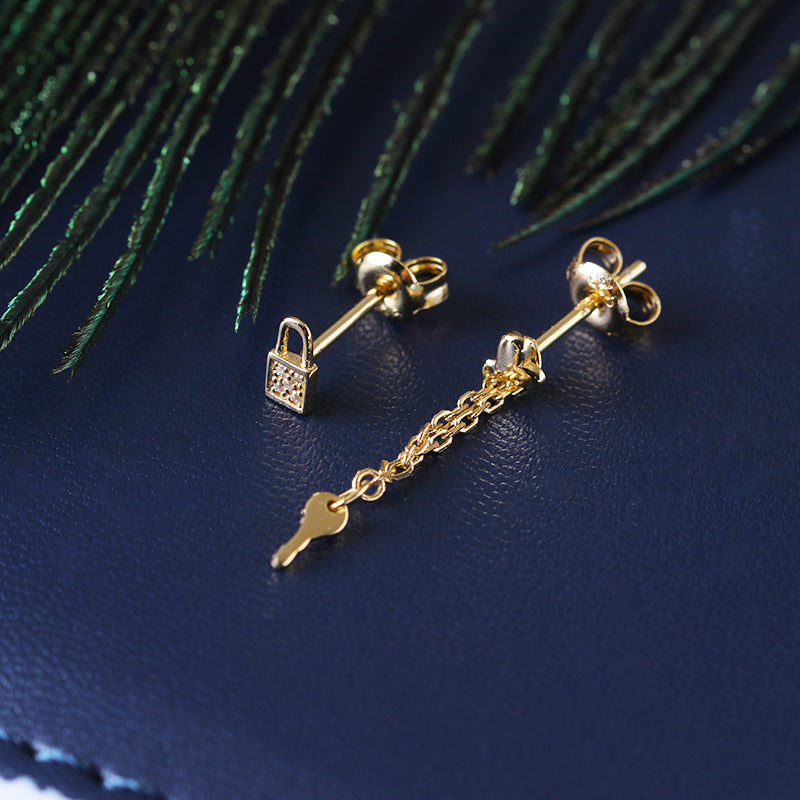 Lock asymmetric earrings