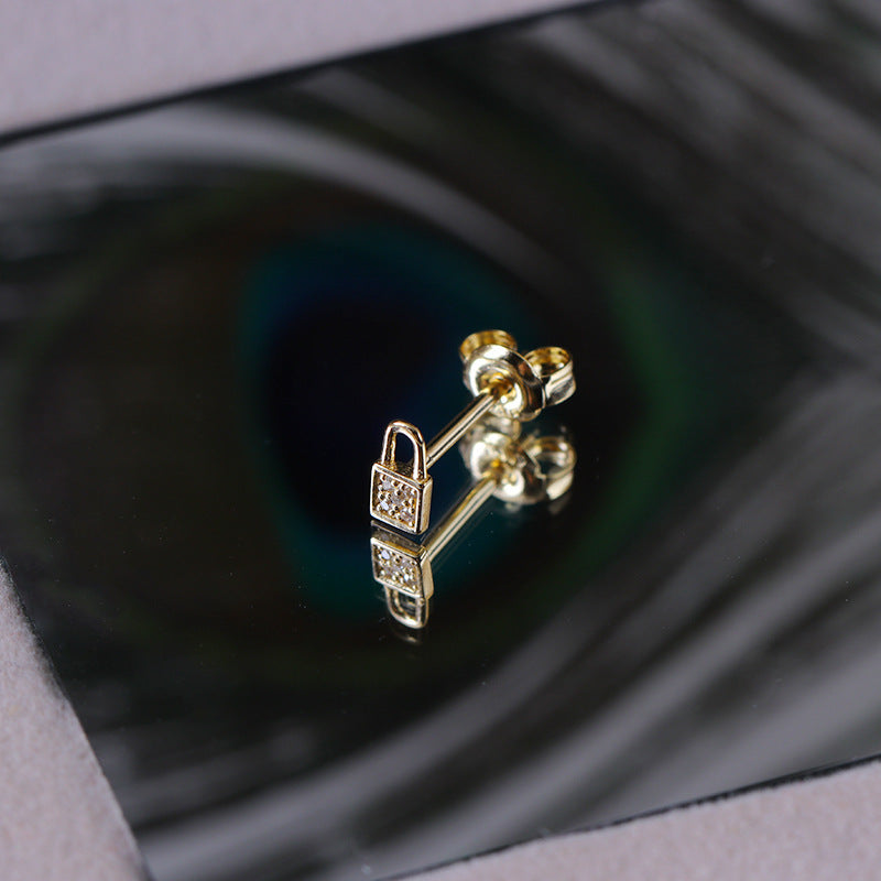 Lock asymmetric earrings