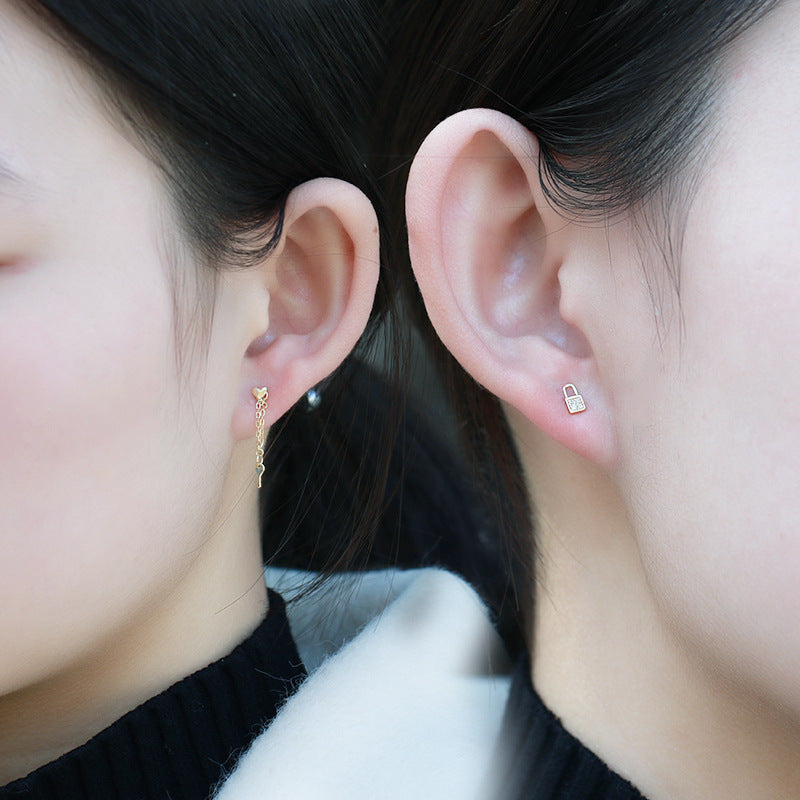 Lock asymmetric earrings