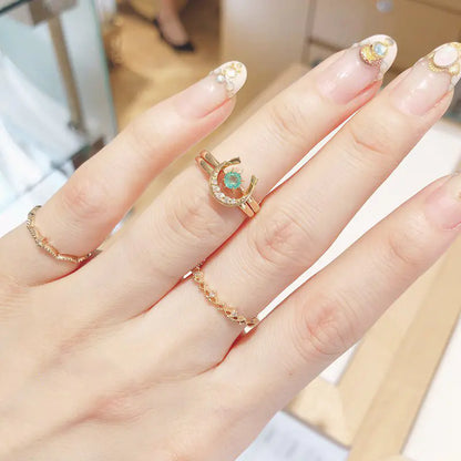 Emelia Gold Emerald Horseshoe Ring